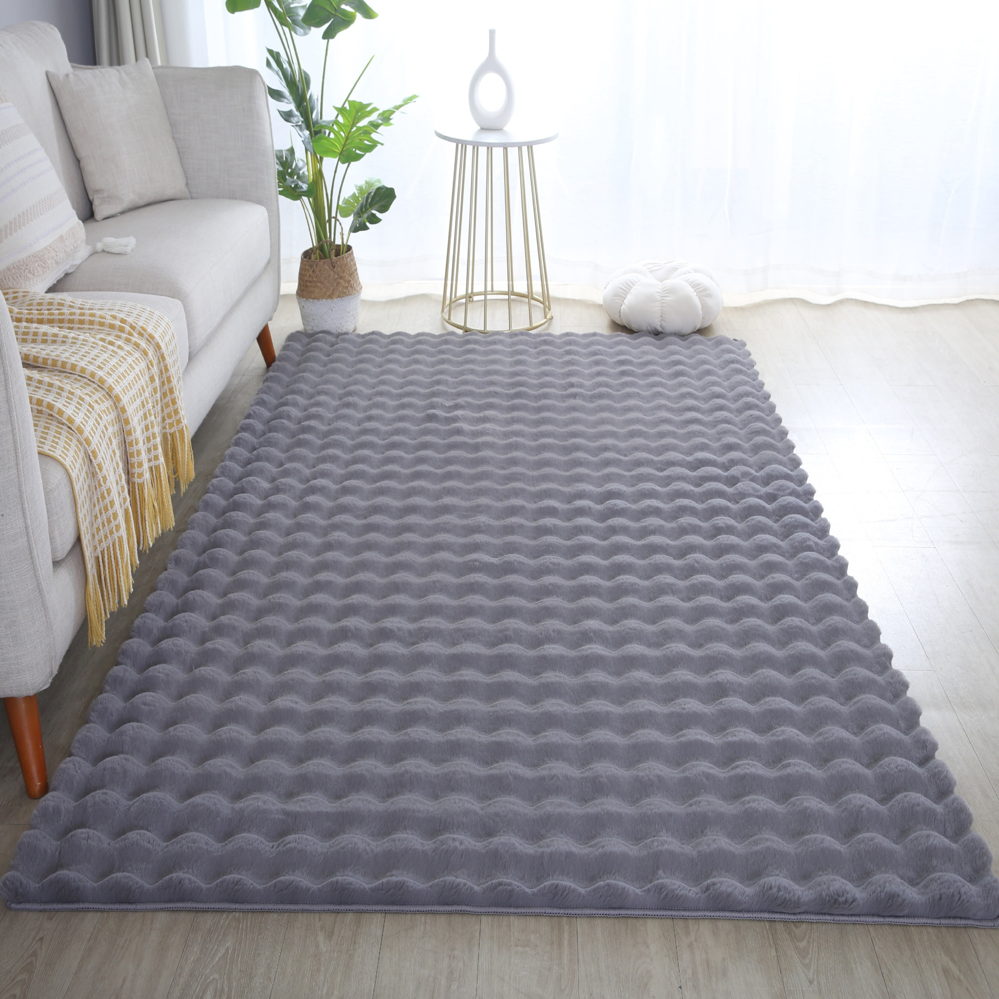 LAPONIE - Tapis uni doux en relief Gris