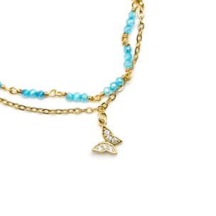 Pulsera con Cristal Azul acabado oro 18k