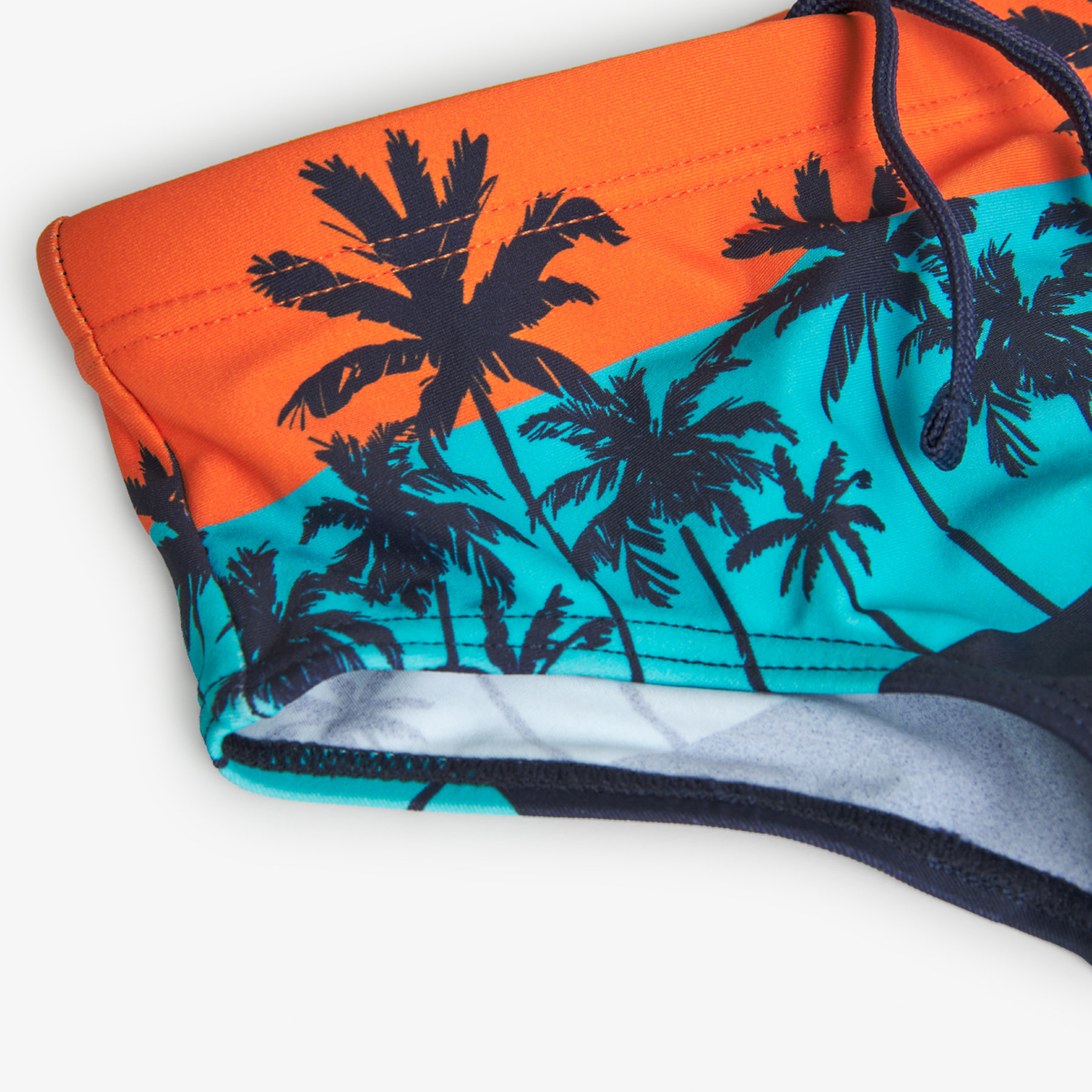 Bañador slip niño estampado, palmeras, naranja