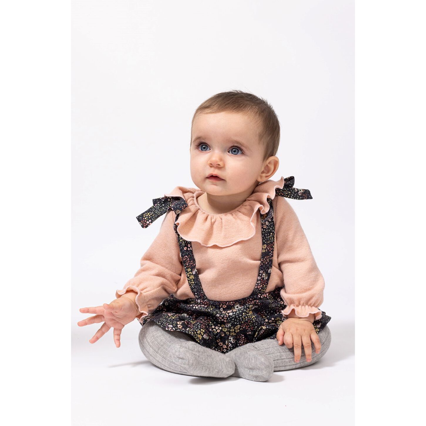 BLUSA PUNTO CUELLO VOLANTE ROSA