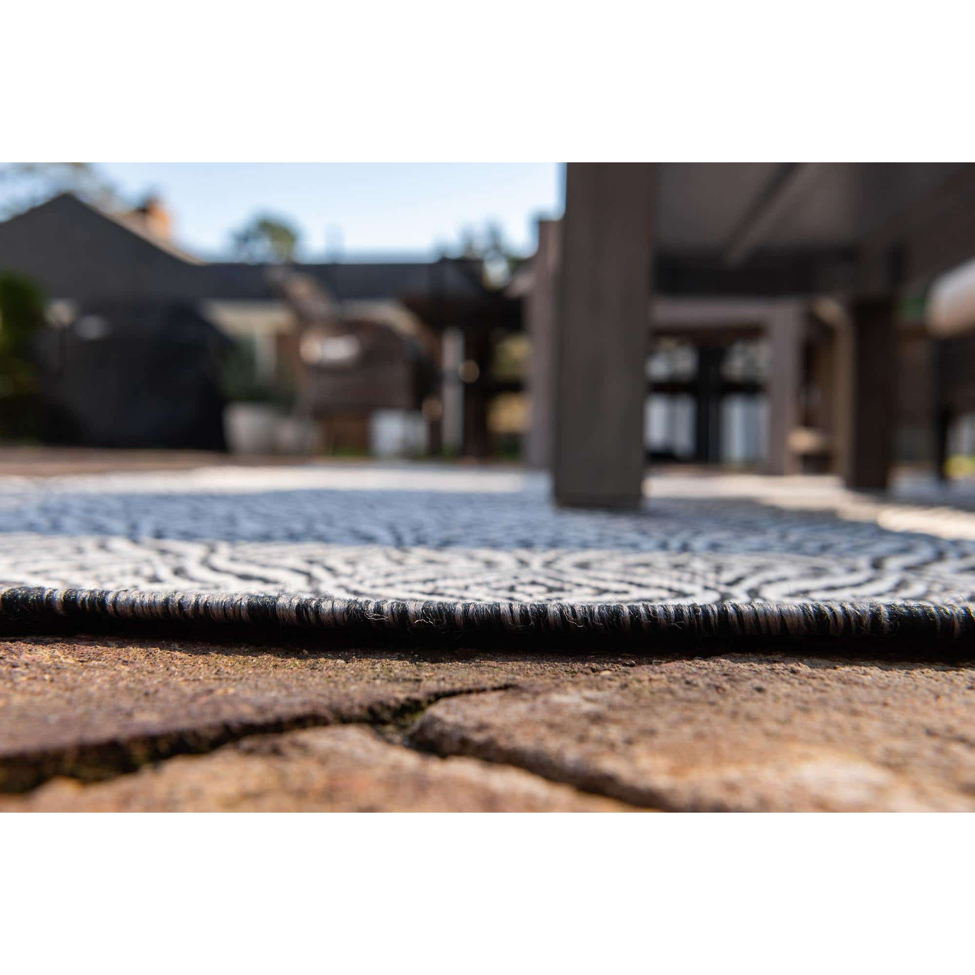 Moa- tapis d'extérieur noir à motif blanc