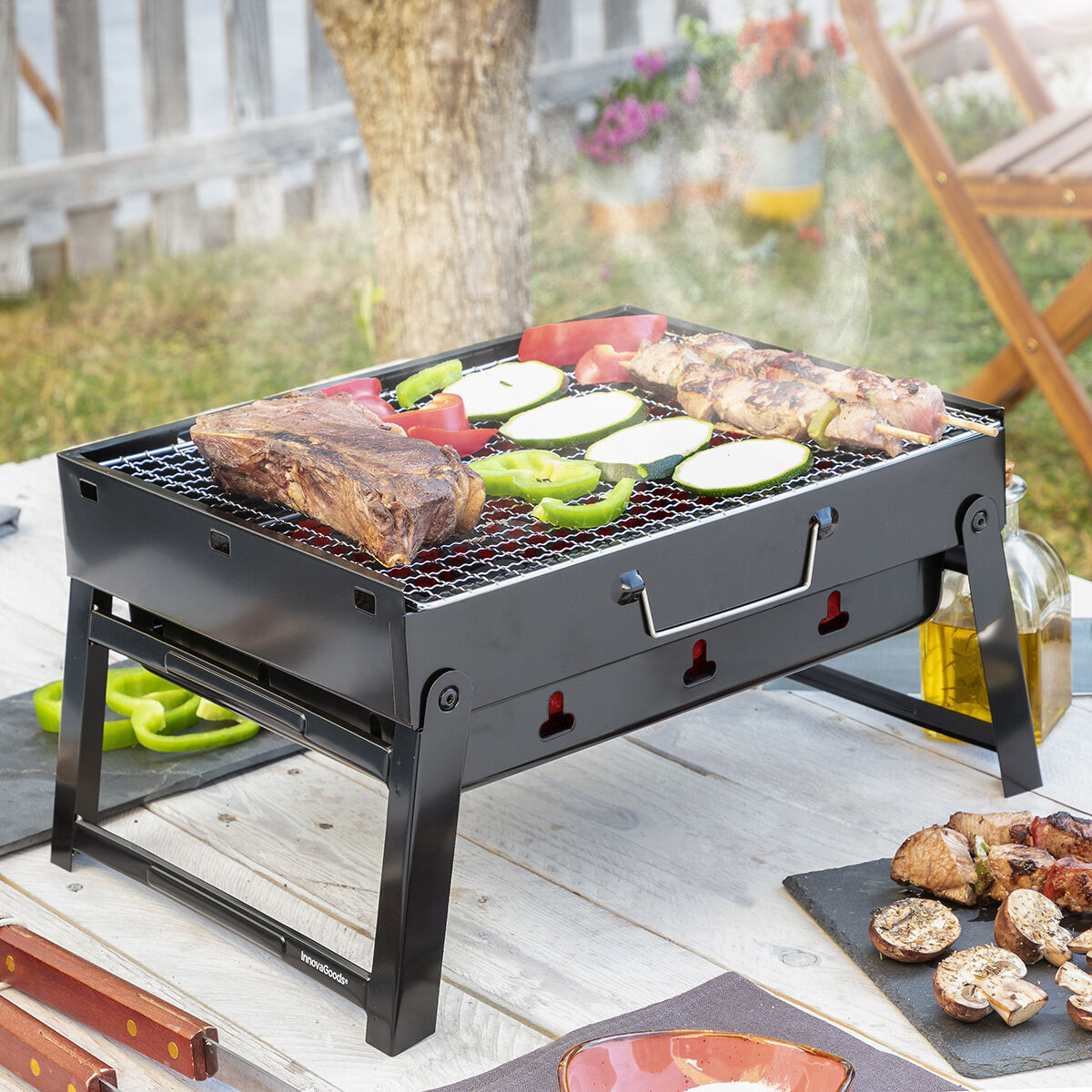 Pack 2 Tappetini per Forno o Barbecue e Barbecue Pieghevole Portatile a Carbone InnovaGoods