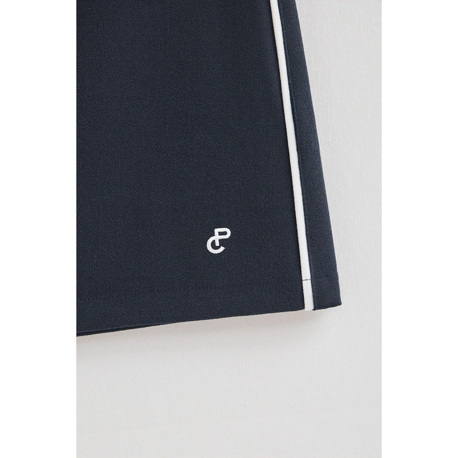 Gonna blu marino June con monogramma ricamato