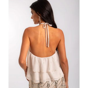 Top de mujer de gasa con volantes y cuello halter ajustable.