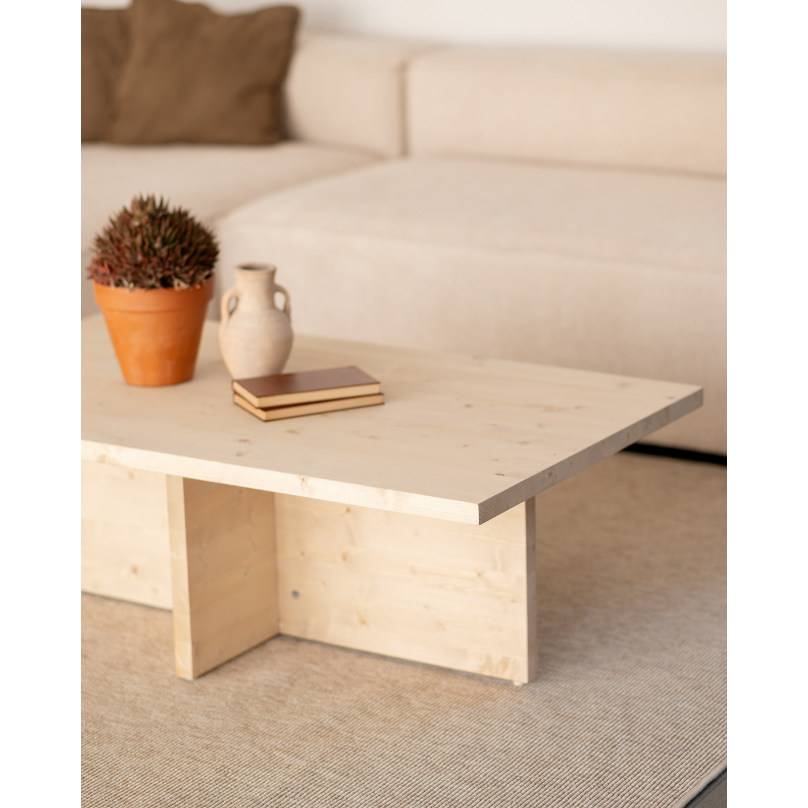 Mesa de centro de madera maciza en tono natural de 120x70cm Alto: 40 Largo: 120 Ancho: 70