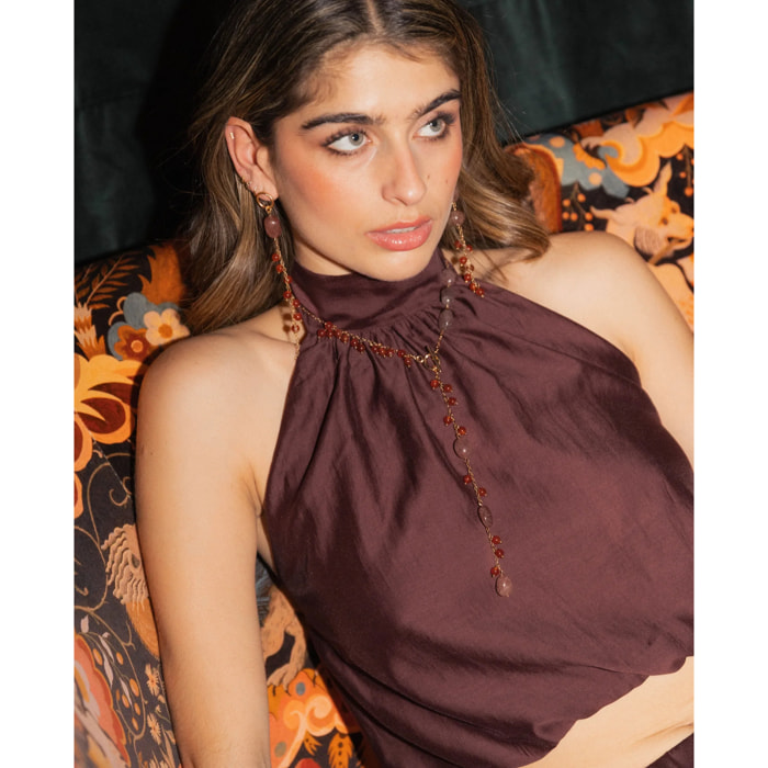 Blusa de mujer cuello halter y bajo abullonado