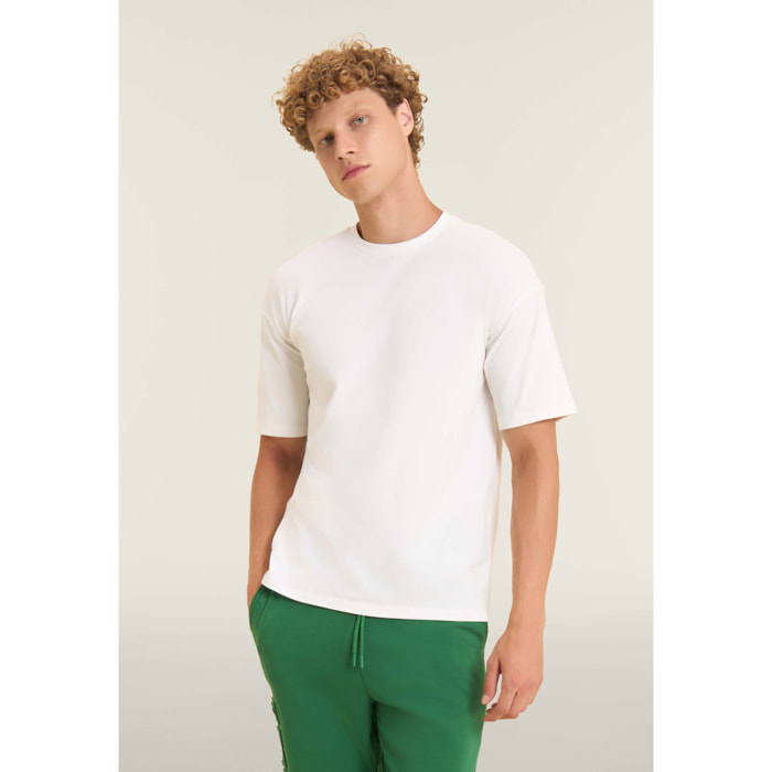 T-shirt regular con stampe lucide e dettagli tono su tono