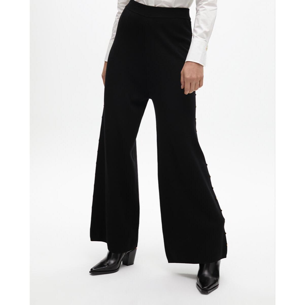 Pantaloni dritti con borchie laterali