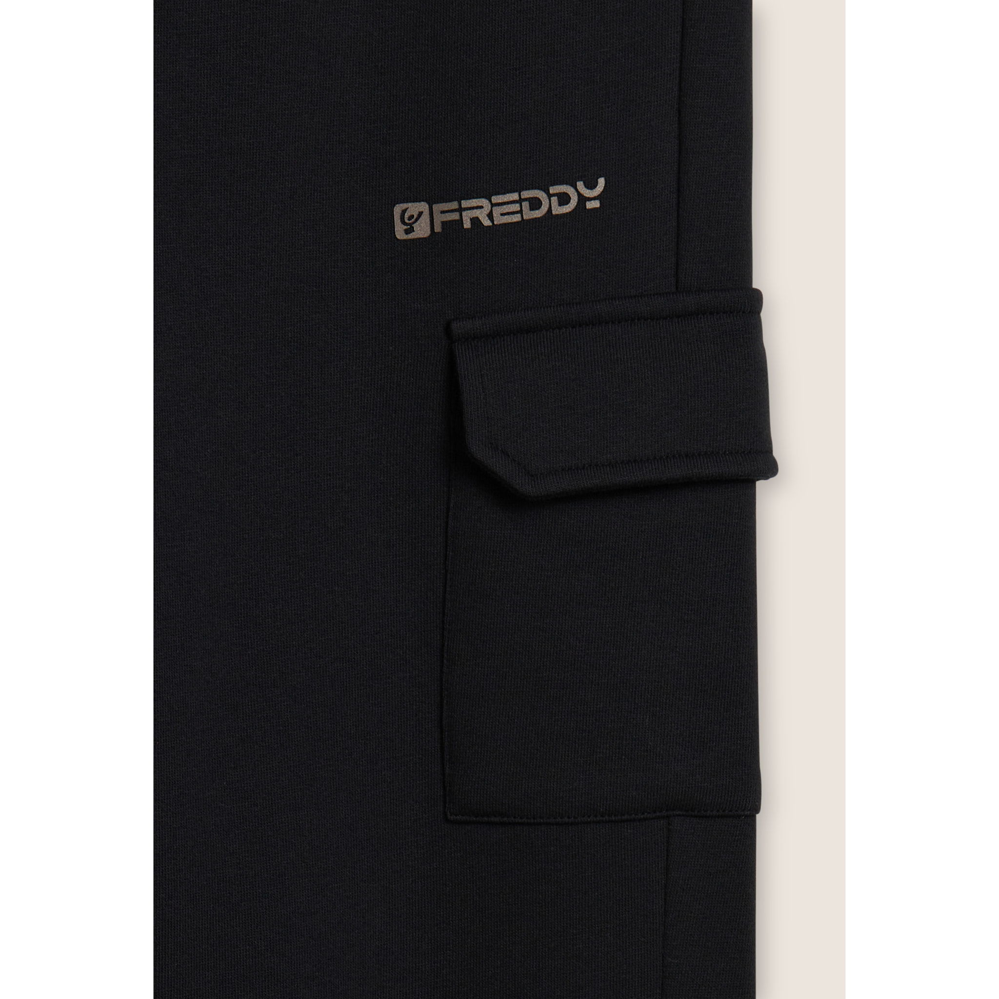 Pantaloni in felpa con tasca cargo e fondo a polsino