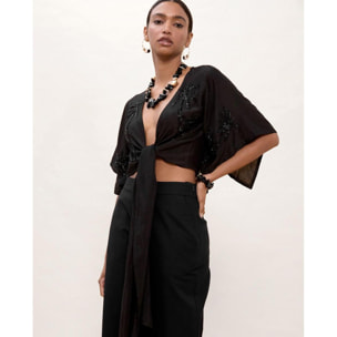 Blusa con nodo e dettagli tonali