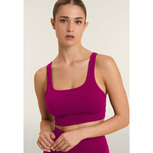 Top sportivo seamless supporto medio con inserti a costine