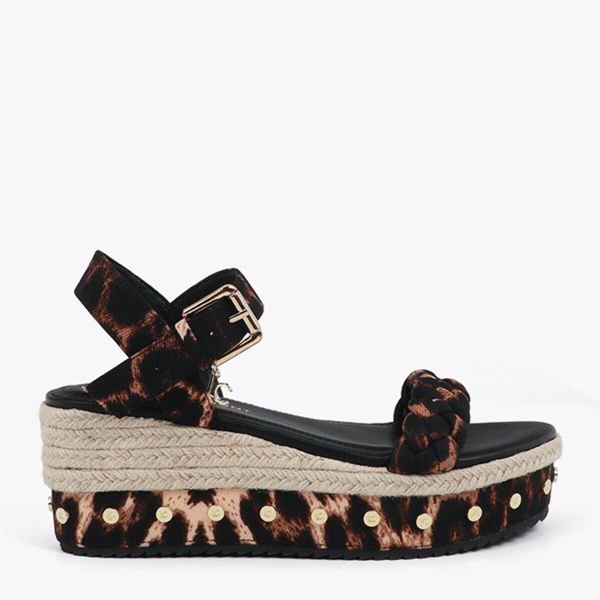 Zeppa con cinturino intrecciato e dettagli metallici