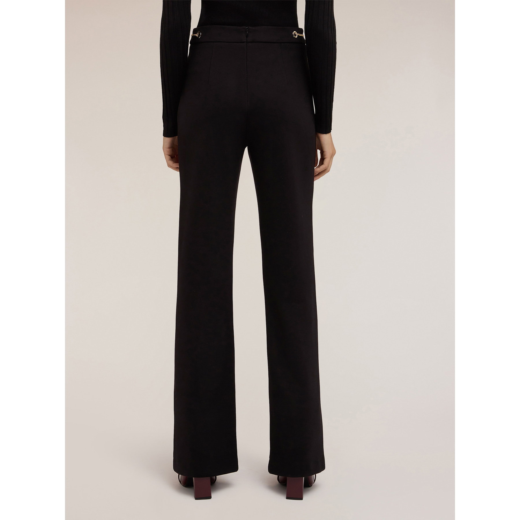 Motivi - Pantalones acampanados con estampado de ojales - Negro