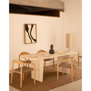 Table à manger en microciment de teinte blanc cassé disponible en différentes tailles