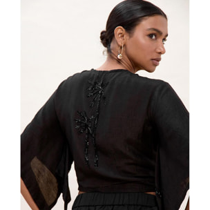 Blusa con nodo e dettagli tonali