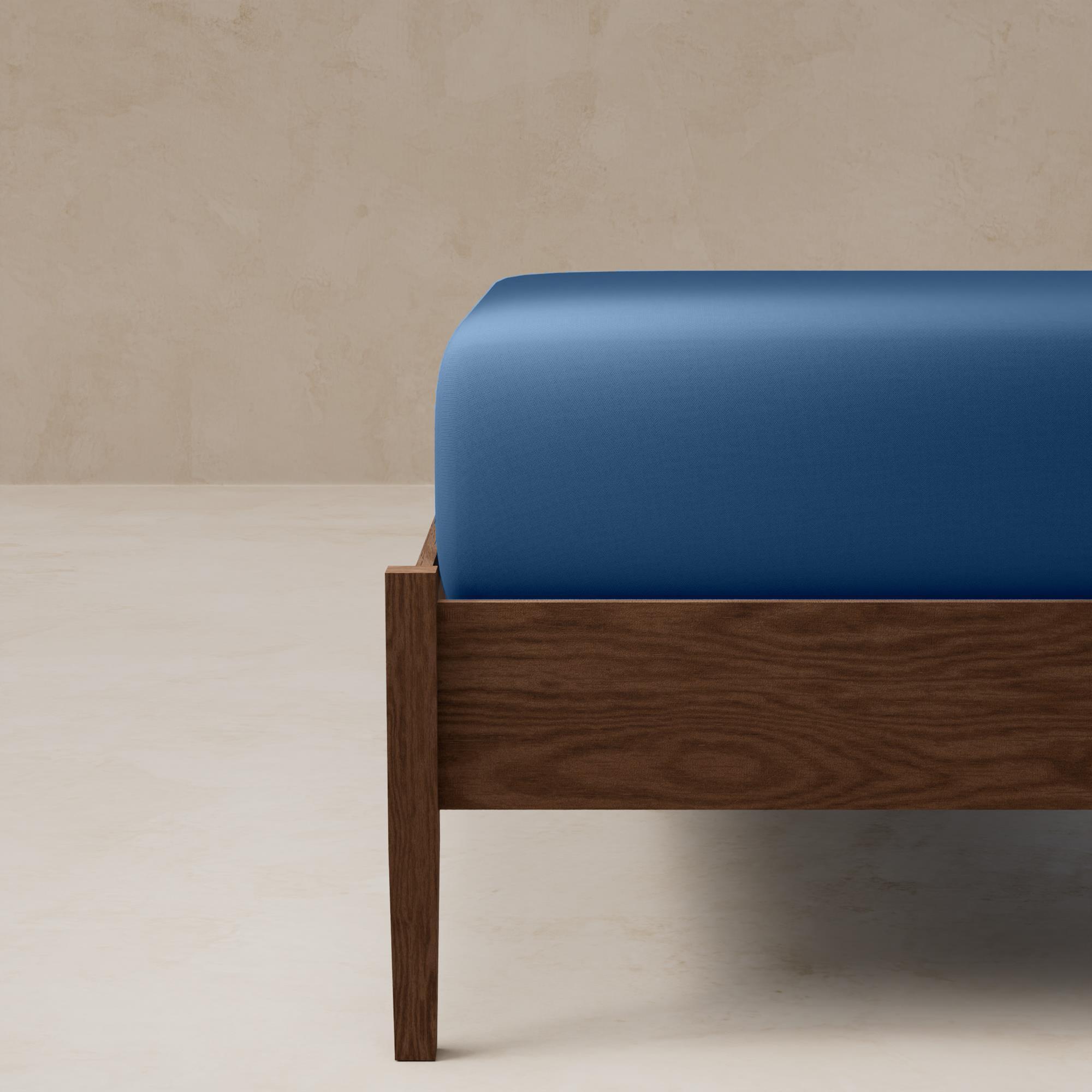 Sábana bajera para cama en color azul rainbow benetton