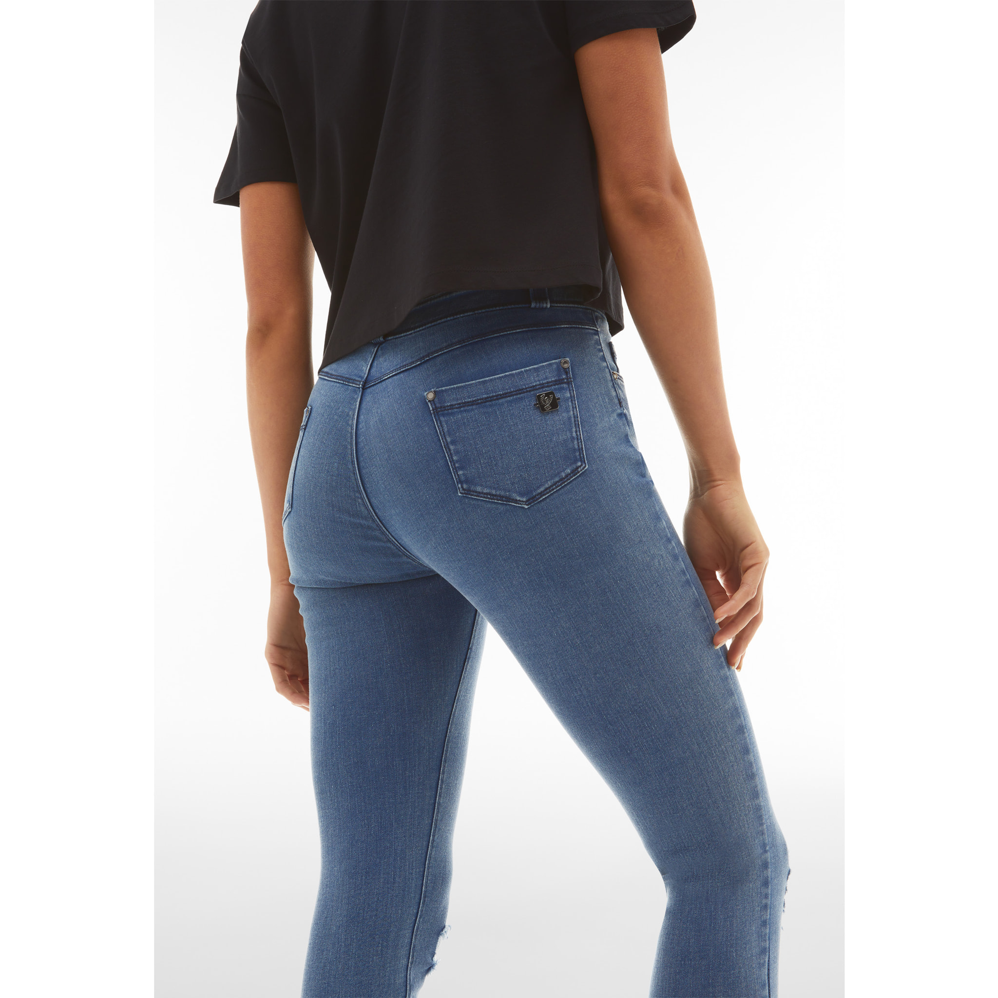 Jeans skinny vita regular in denim distressed sostenibile