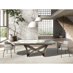 Mesa comedor extensible ovalada barril con tapa de mármol porcelánico blanco con vetas en tonalidades grises y marrones en acabado mate 200x100x76cm