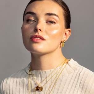 Pendientes de Circonita Esmeralda acabados en oro amarillo de 18k
