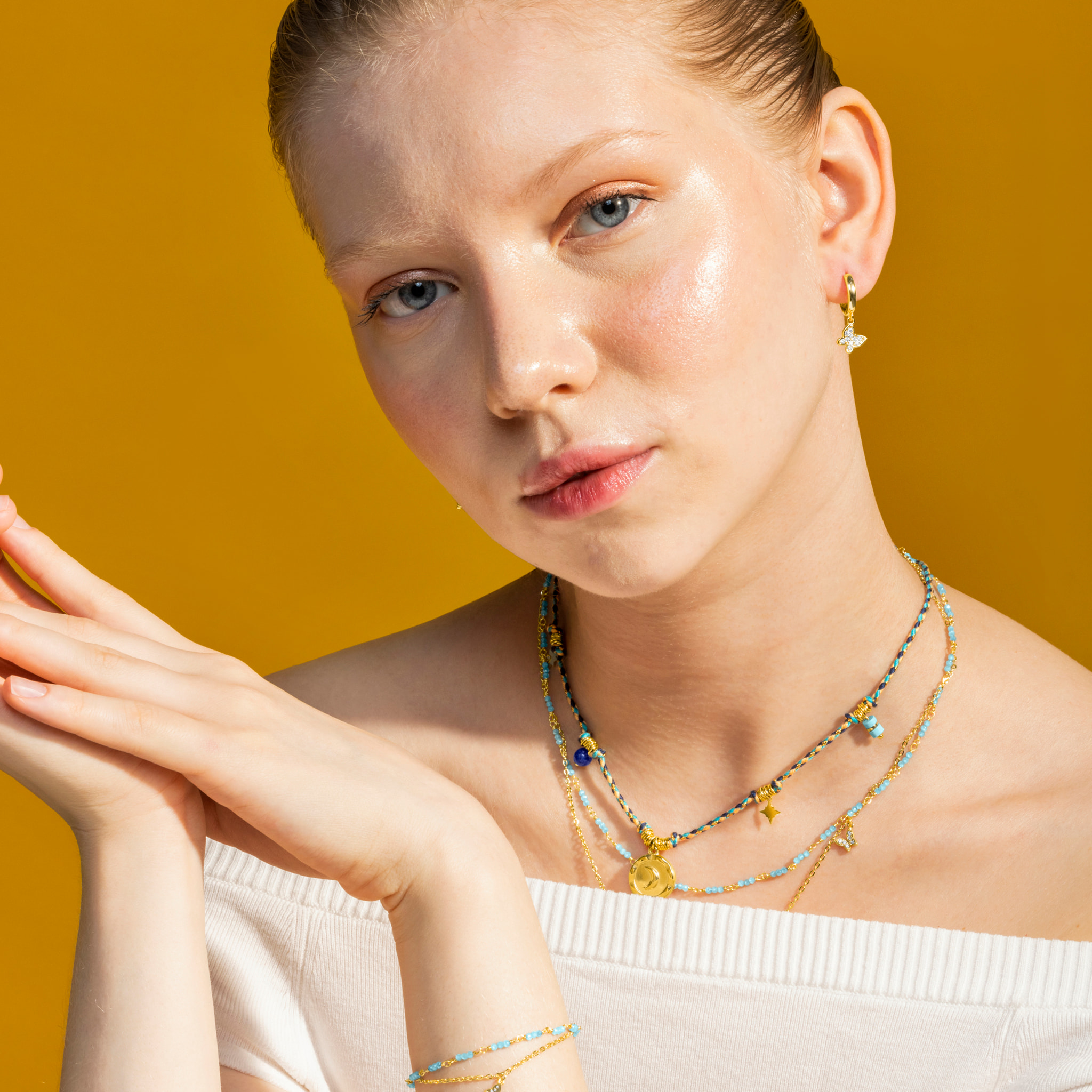 Collar con Cristal Azul acabado oro 18k