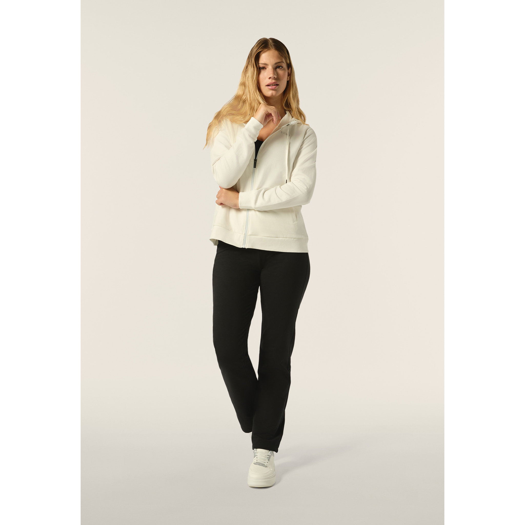 Tuta donna comfort fit in felpa con cappuccio stampe argento