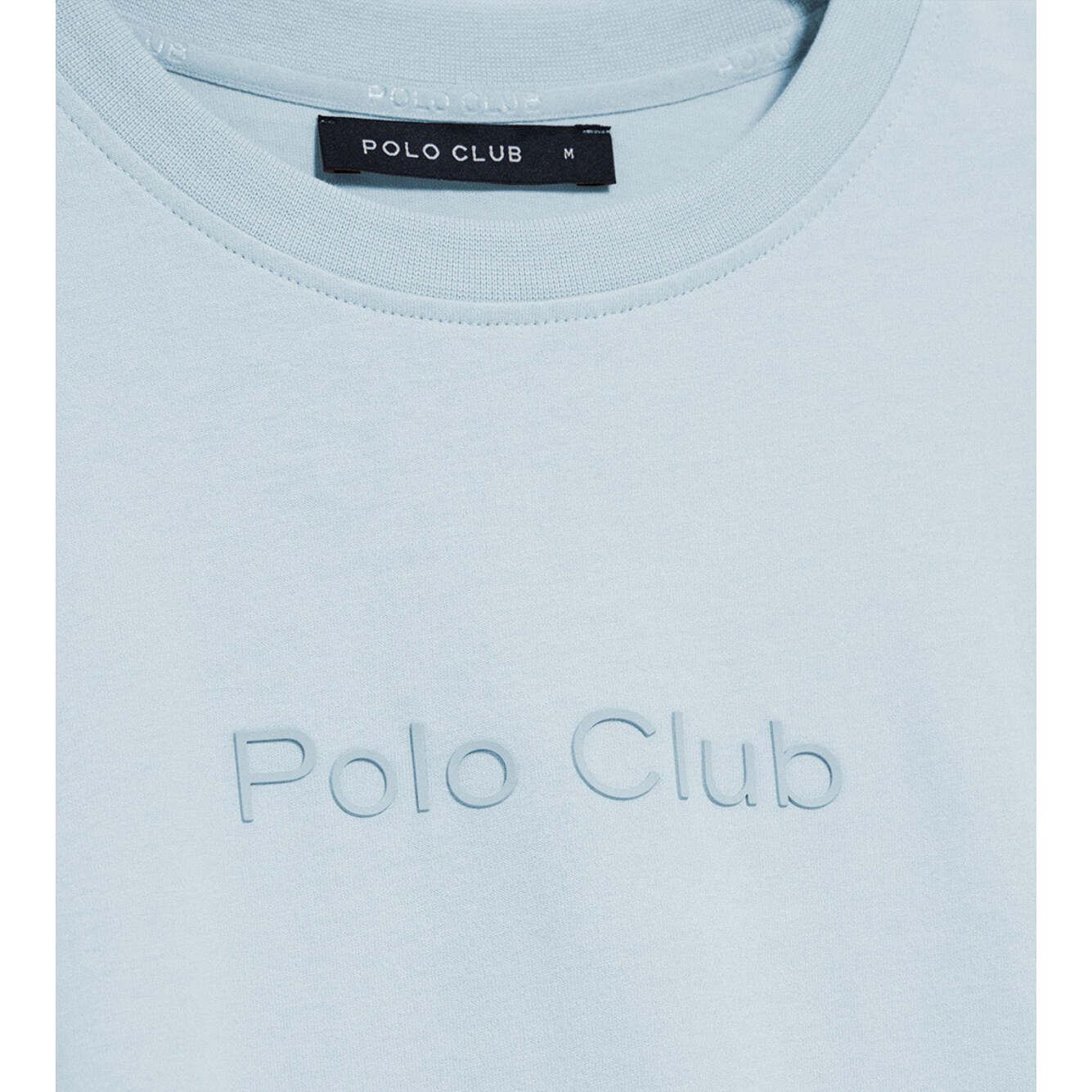 Camiseta azul claro de manga corta y cuello redondo con logotipo Polo Club