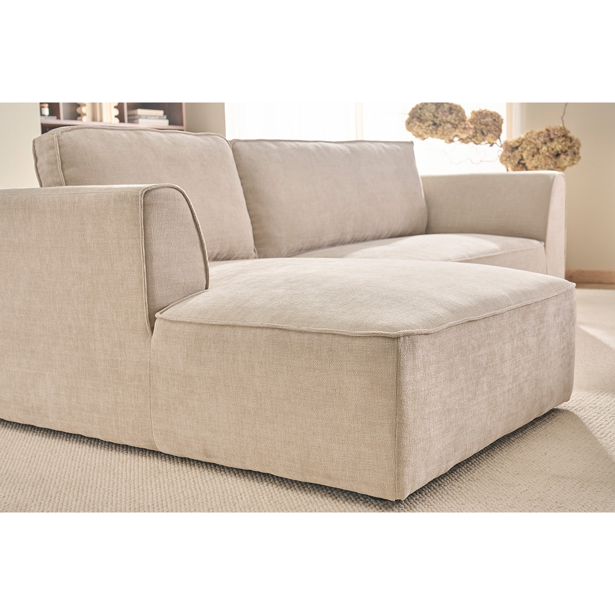 Canapé d'angle gauche design en tissu effet velours texturé beige 3 places GRAMMY