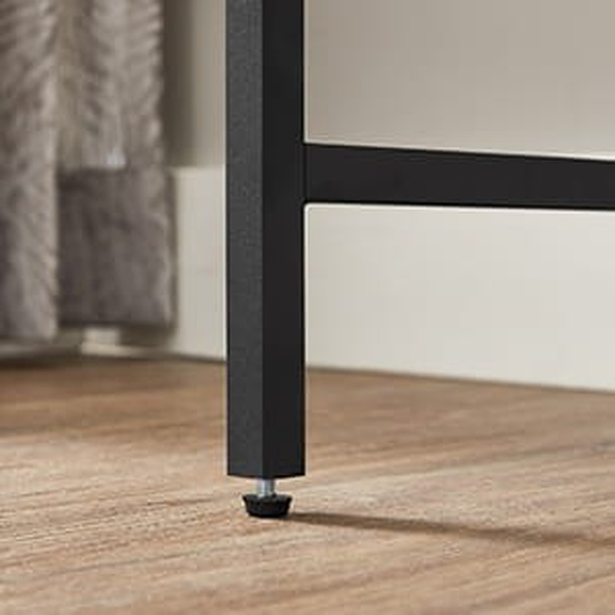 Consolle moderna in acciaio nero e vetro temperato