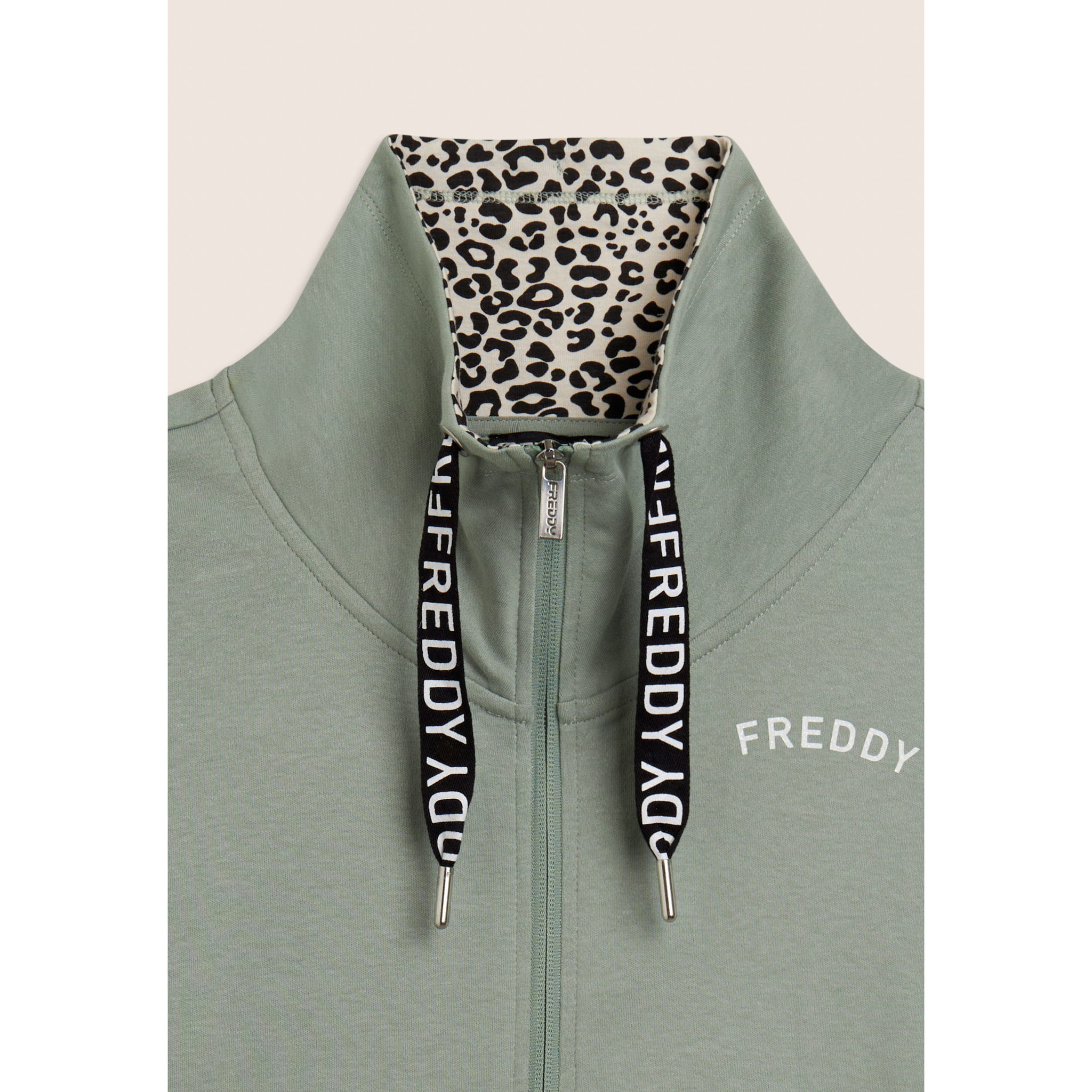 Tuta con zip e collo alto con interno animalier