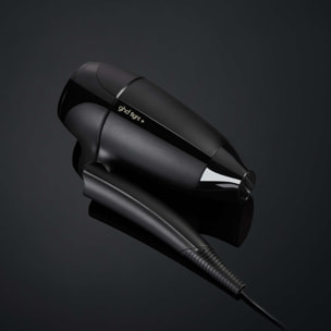 Coffret sèche-cheveux de voyage ghd flight+ avec sa mini brosse à cheveux et son vanity voyage
