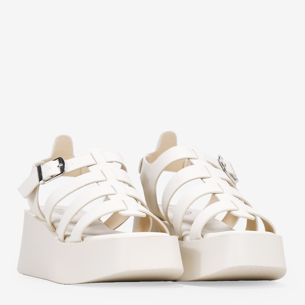 Sandalias de plataforma beige con hebilla