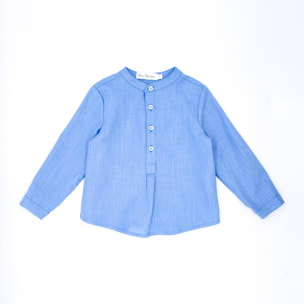 Camisa de lino azul. Cuello mao y tapeta con botones en el centro.