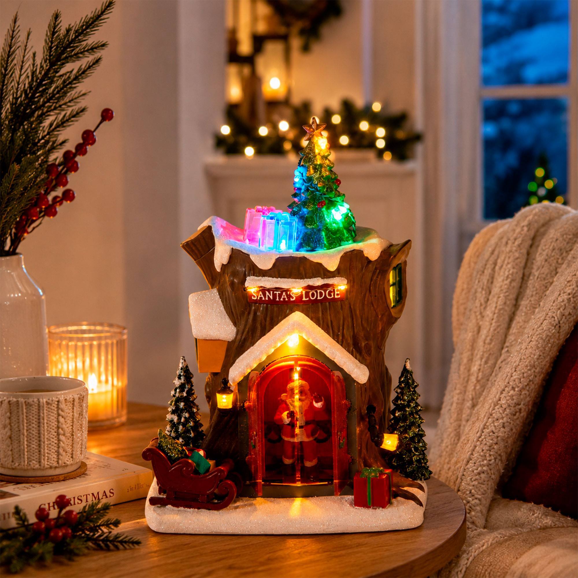 Cabaña de papá noel con luces led, movimiento y música, usb o pilas 18,5x17x25,5 cm