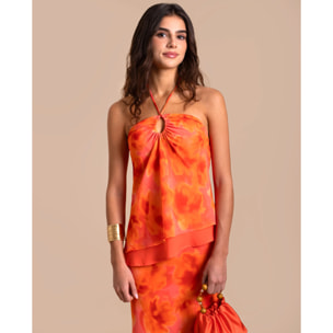 Blusa de mujer con cuello halter y lazada.