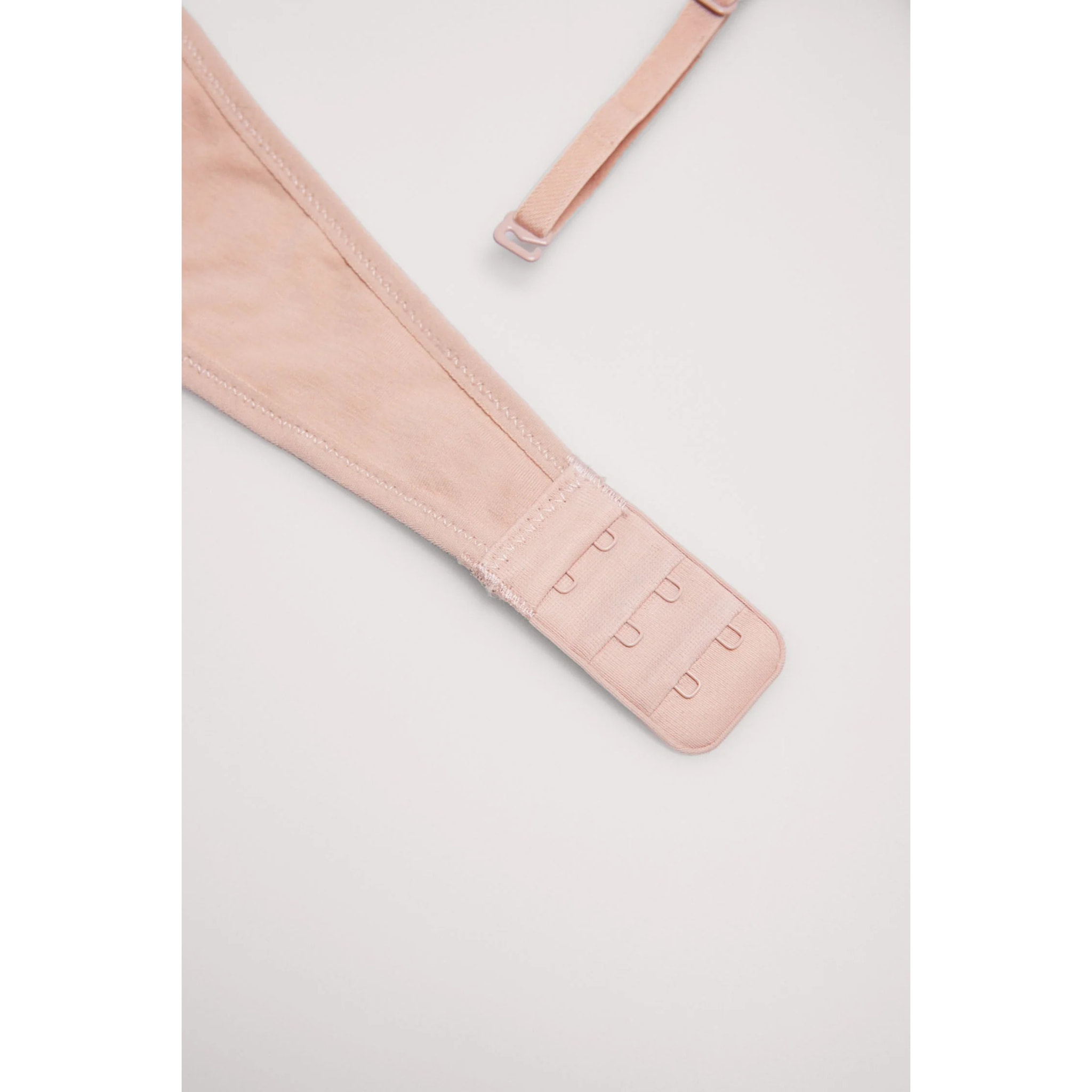 Reggiseno a fascia beige per ragazzi