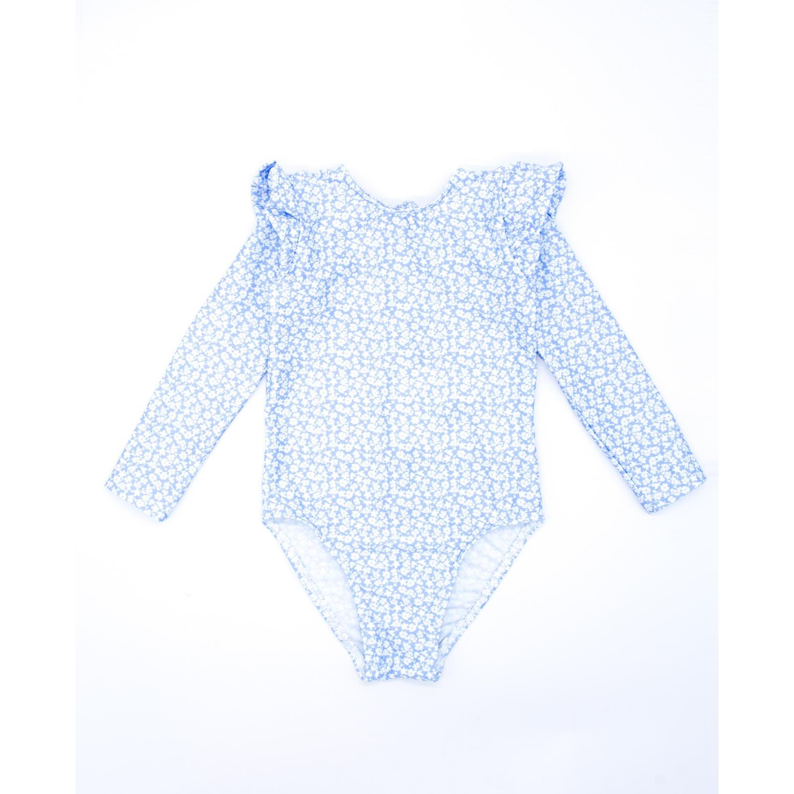 Bañador de manga larga de flor azul celeste, con volantes.