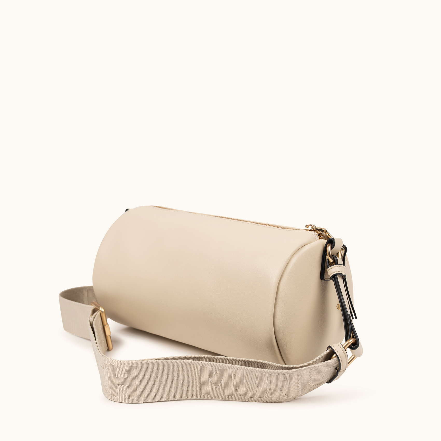 Bandolera Cilíndrica Color Crema con Charms y Asa Técnica CHARMS CROSSBODY BARREL CREAM