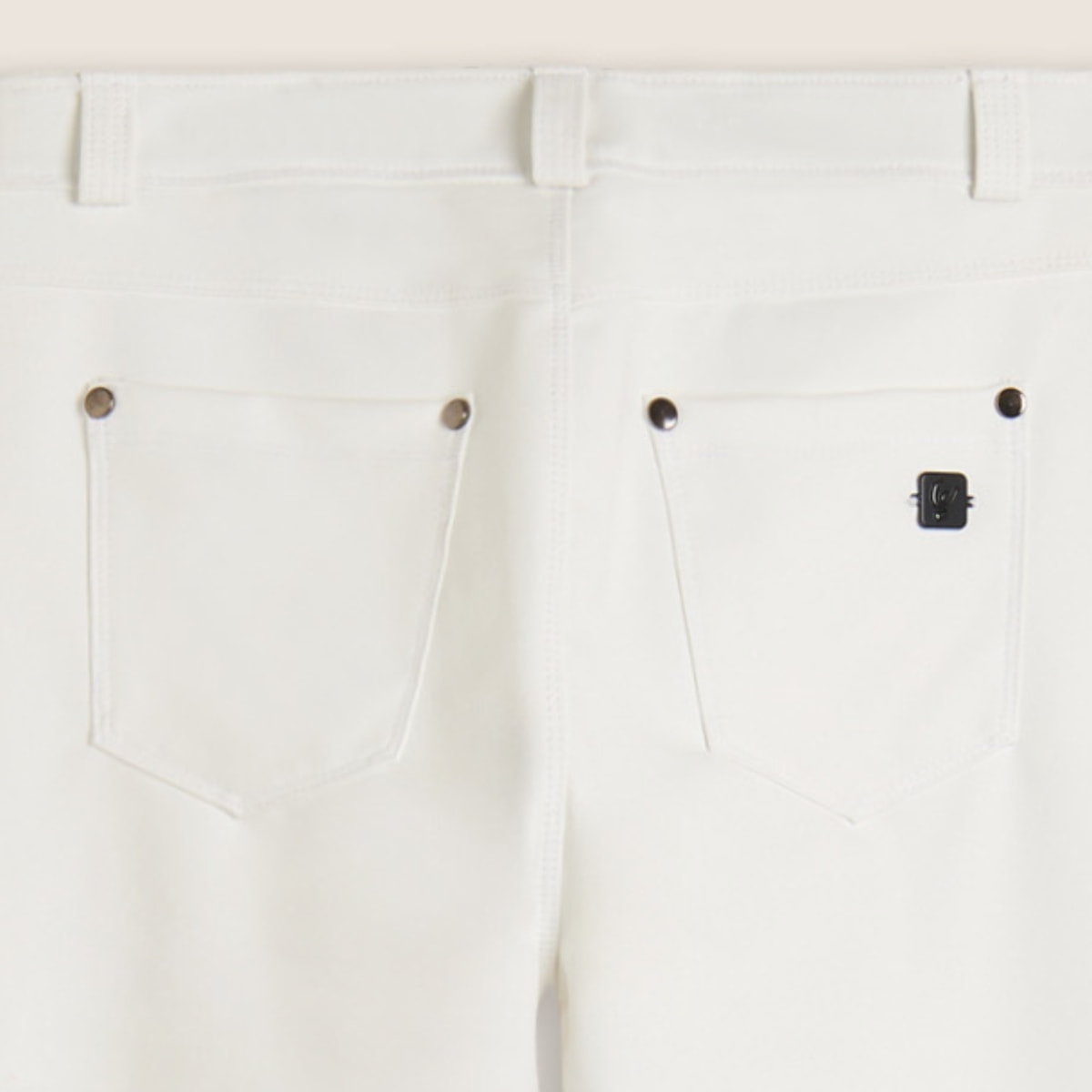 Pantaloni skinny in similpelle con logo ricamato