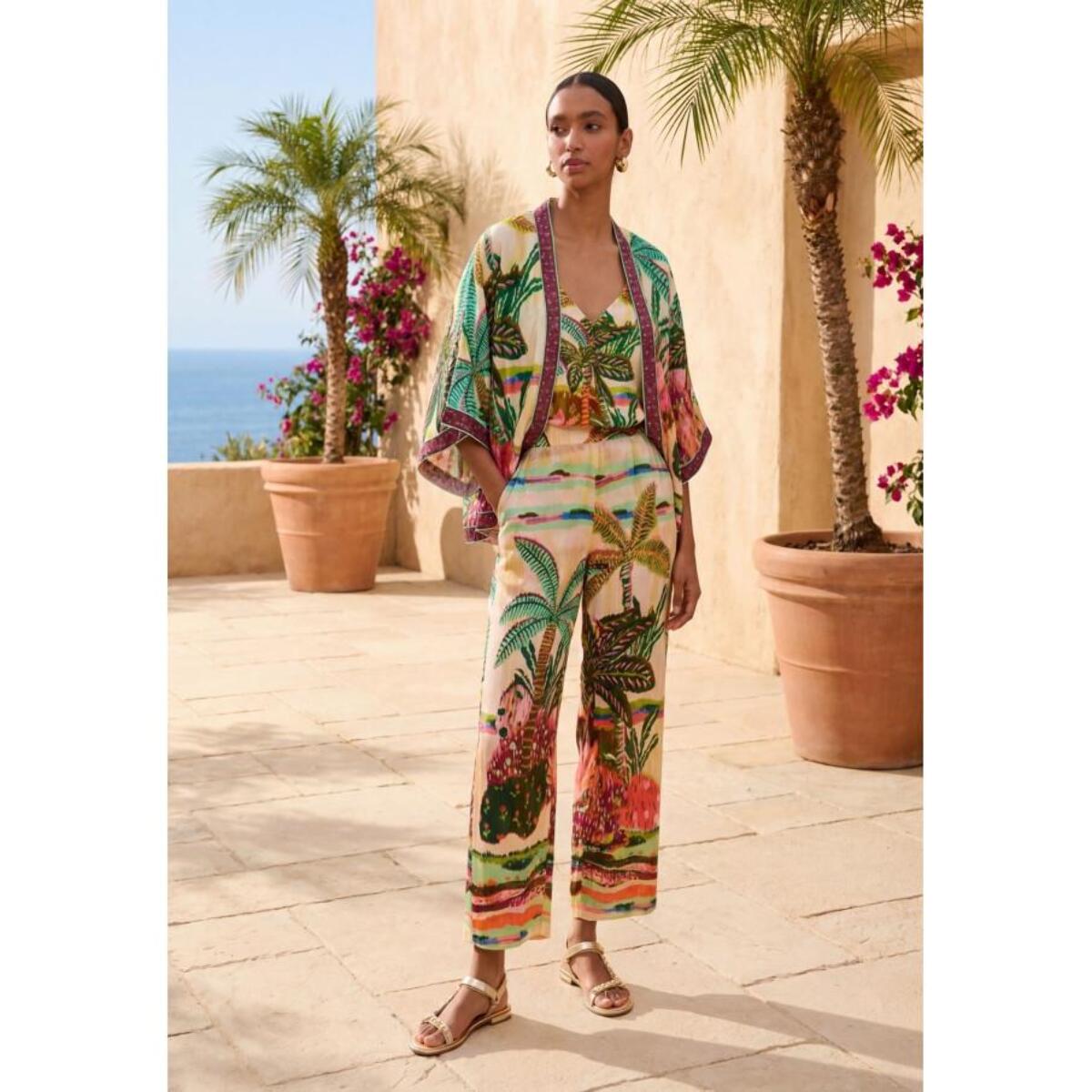 Pantaloni con stampa di palme multicolori