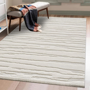 Tapis Tegi en relief avec motif simple et effet faux-uni