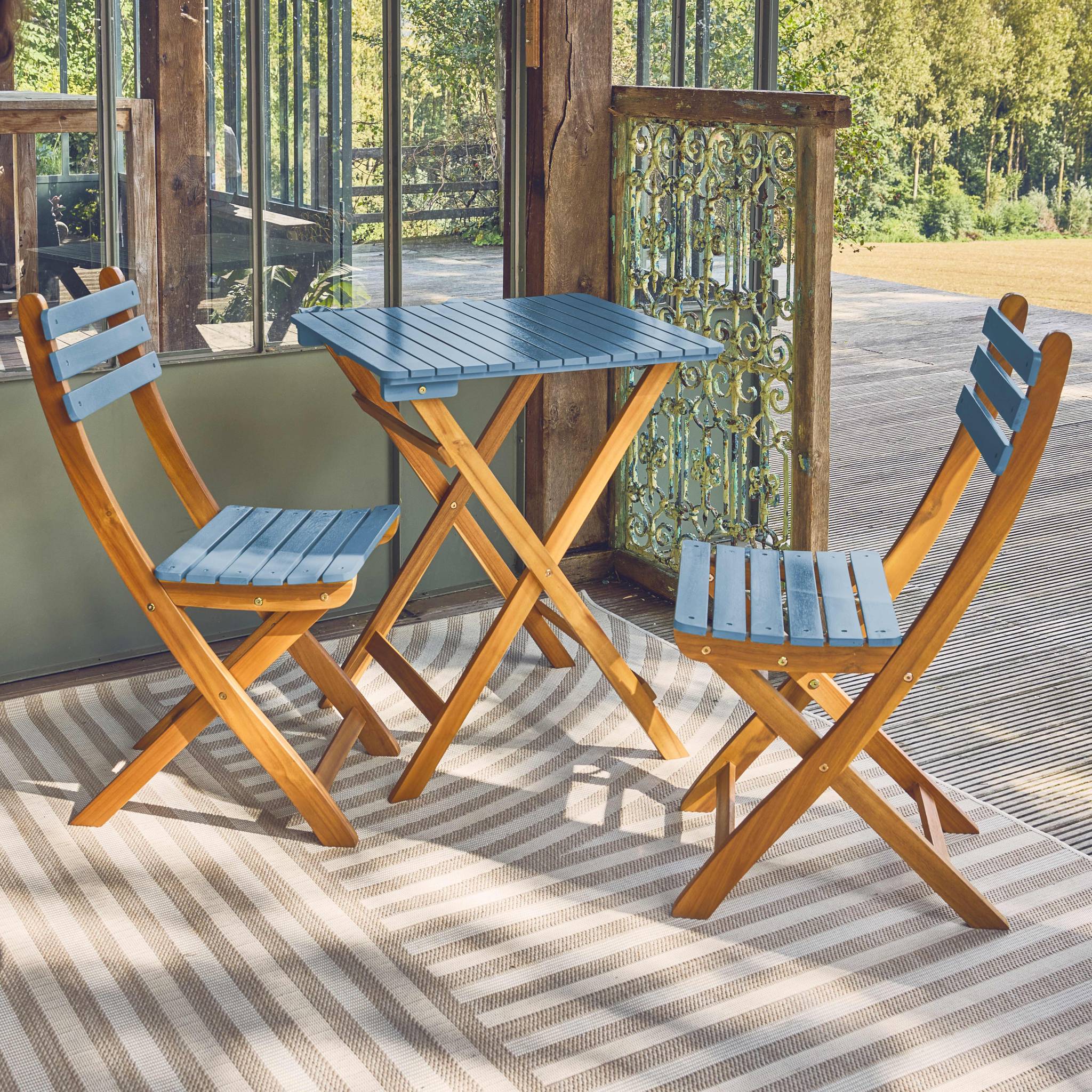 Table de jardin pliante bois d'acacia + 2 assises bleu HILORA . table carrée