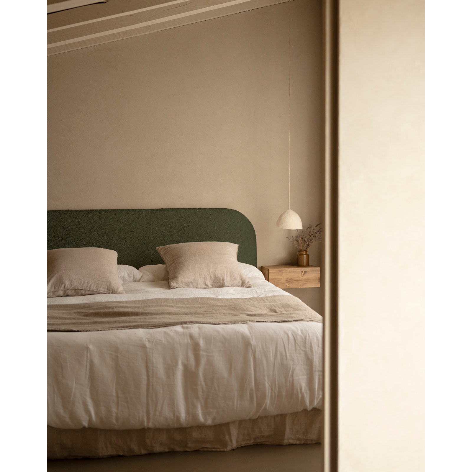 Cabecero tapizado desenfundable de bouclé verde de varias medidas