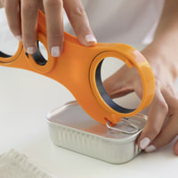 Apriscatole multifunzione 5 in 1 - arancione
