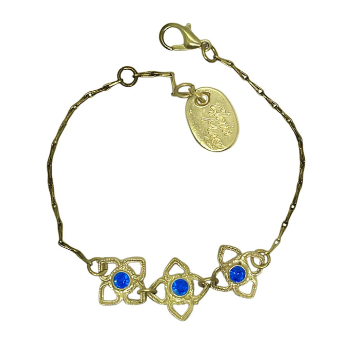 Pulsera Mismy dorado Tres flores y cristal SW color azul