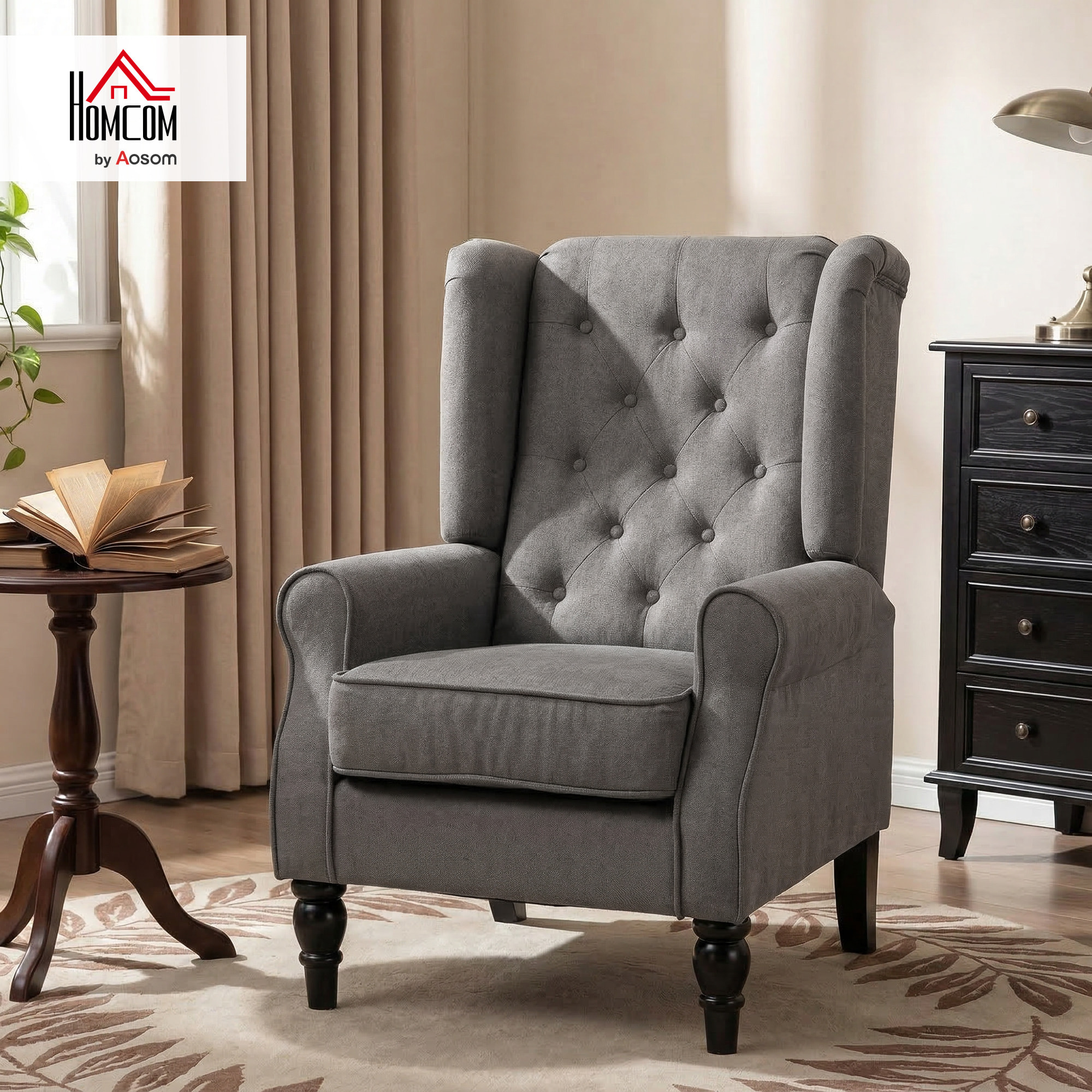 Fauteuil à oreilles style Chesterfield dossier capitonné grand confort bois noir tissu gris foncé