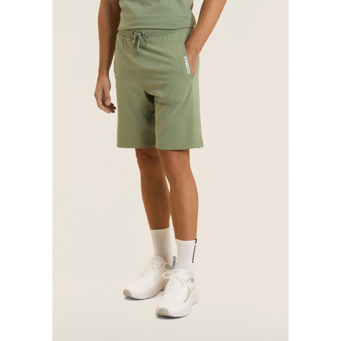 Pantaloni corti in jersey stretch con taschino