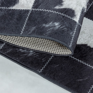 FIESTA - Tapis patchwork imitation peau noir et blanc