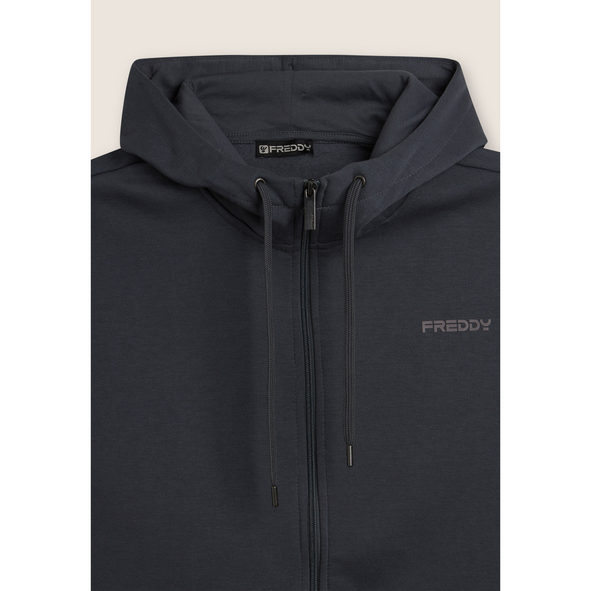 Tuta con full zip, cappuccio e fondo a polsino