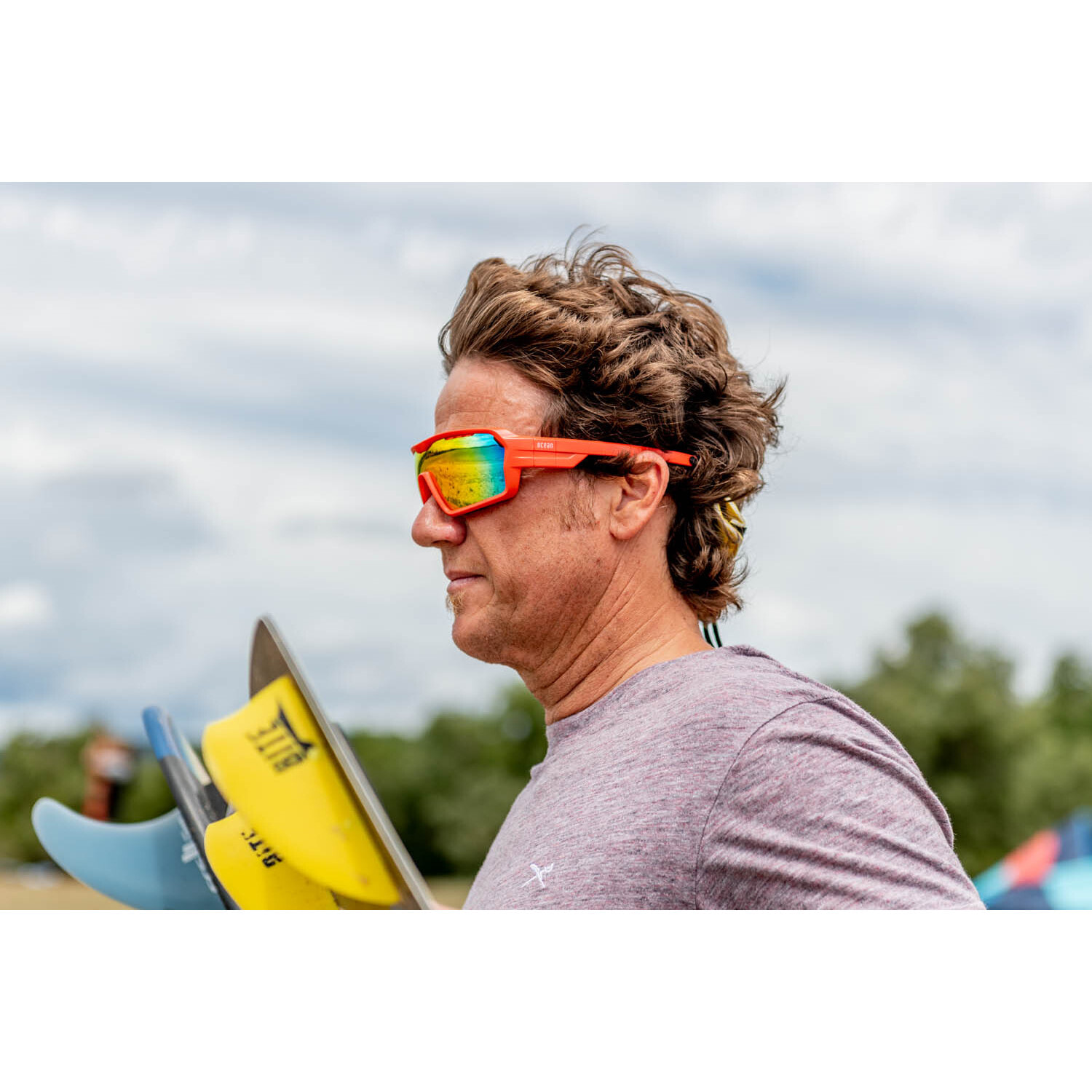Gafas de deportes acuáticos OCEAN CHAMELEON - Rojo mate / Revo roja con plaquetas puntas y espuma rojas con correa roja