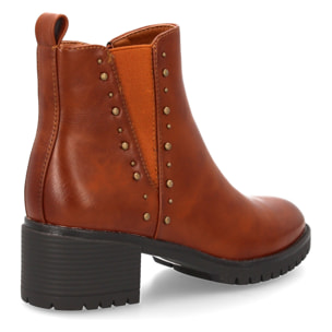 Botín chelsea con tachuelas y elástico